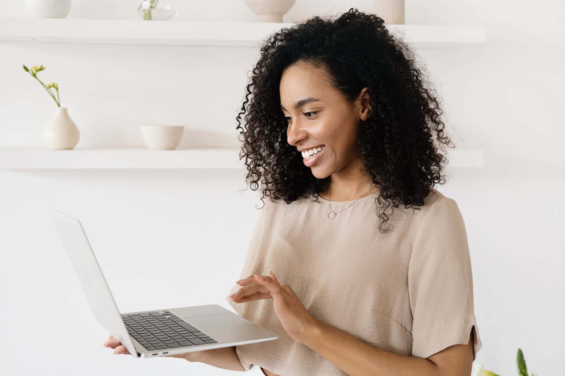 a woman using a laptop